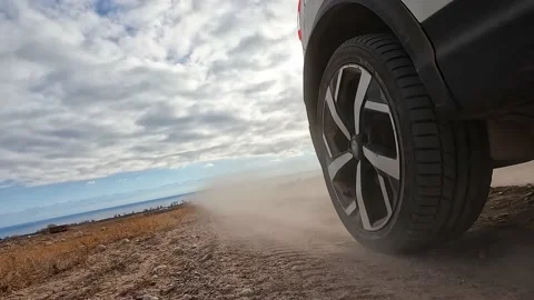 View of the right rear wheel of the SUV car. Close-up Stock Footage 230610509