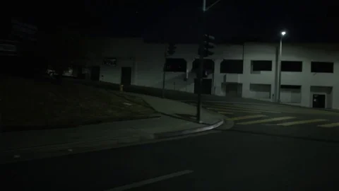 View from right-side window of moving car at night Stock Footage 83058884