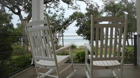 View Rising Behind White Rocking Chairs On Porch Vídeo Stock 167738775