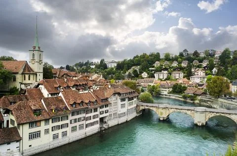 View of the river Aar as it flows through the medieval city of Bern. Stock Photos