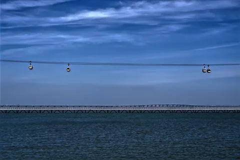 View with a river and some cable cars Stock Photos