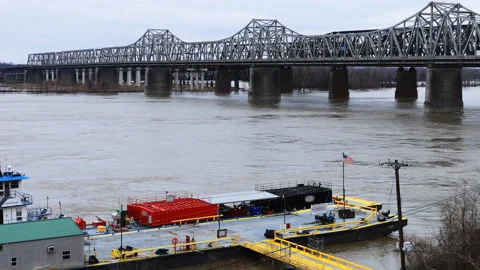 View of River Barge passing under I-40 Hernando DeSoto Bridge, exclusive 4K Stock Footage 170778946