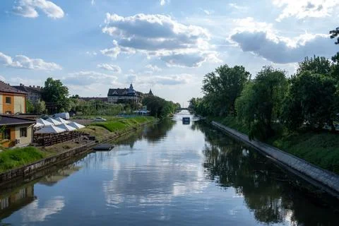 View of the river Bega and a cloudy sky, city of Timisoara, Romania Stock Photos