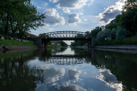 View of the river Bega and a cloudy sky, city of Timisoara, Romania Stock Photos