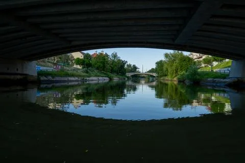 View of the river Bega and a cloudy sky, city of Timisoara, Romania Stock Photos