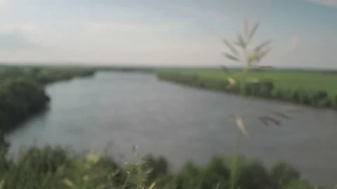 View of the river from behind the hill Stock Footage 155954283