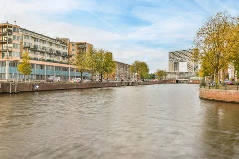 A view of a river with buildings on either side Stock Photos