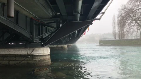 View on the river in the cloudy spring day from under the bridge Stock Footage 86990070