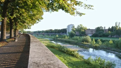 View of the River Crossing Parma and Rapid Path along the Pavement Stock-Footage 139696611