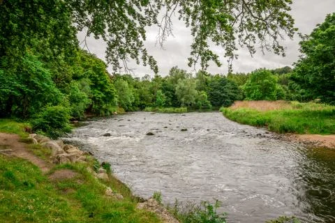 A view of River Don flowing in Seaton park in summer time, Aberdeen, Scotland Stock Photos