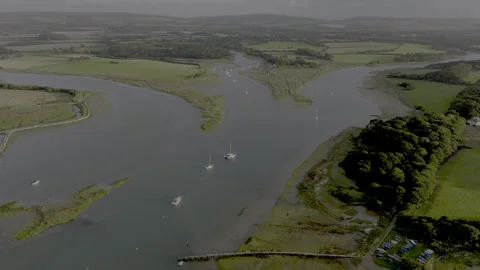 A view of a river with a few boats floating on it Stock Footage 298281215