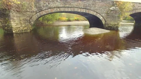 View of river flow and bridge in Snowdonia Wales Stock Footage 56524271