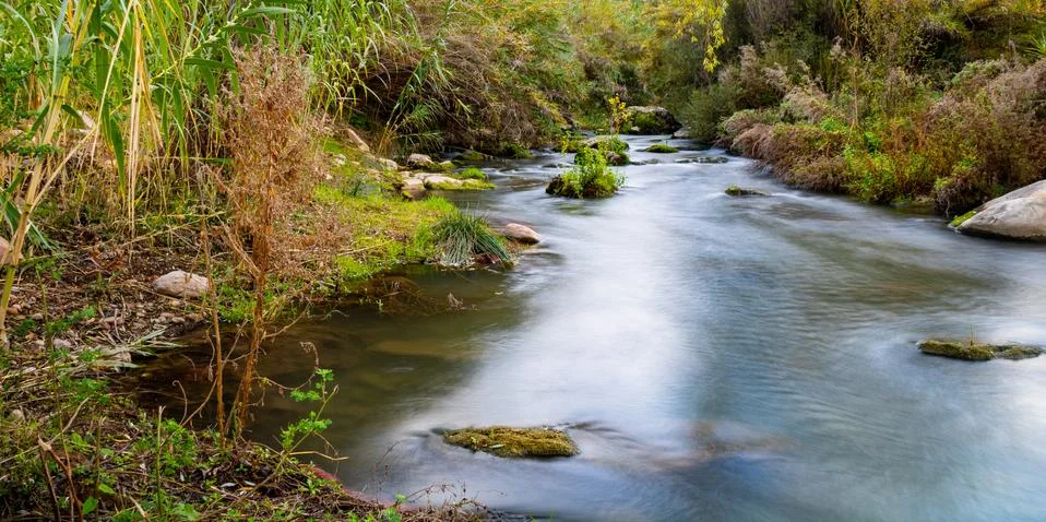 View of the river with rocks Stock Photos