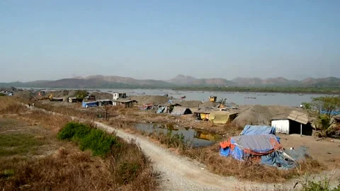 View of River Sand mining boats from indian moving train Vaitarna Mumbai India 스톡 동영상 139671251