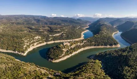 View of river Ter bend and a Benedictine monastery of Sant Pere de Casserres Stock Photos