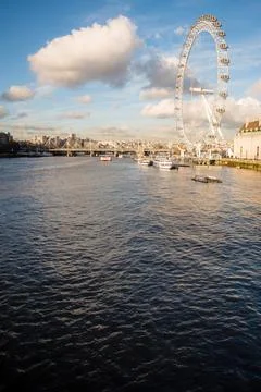 View of the River Thames in the foreground and the London Eye in the background Stock Photos