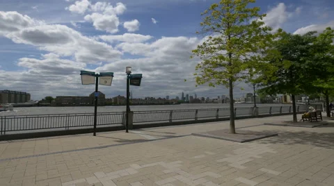 View of River Thames from a pedestrian area near the Canary Wharf Pier Stock Footage 61574856