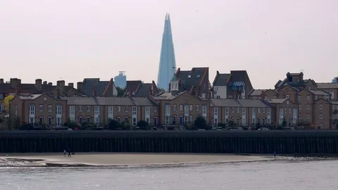 View of the River Thames with Shard building and riverside houses Stock Footage 108248300