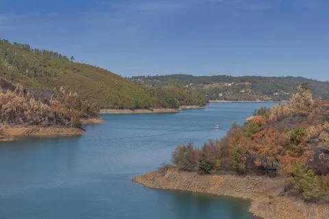 View to the river from the Tomar mountain range. with Burnt Forest. Stock Photos