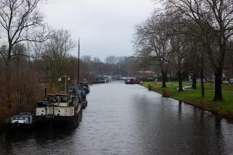 View of river Vecht from J.M. de Muinck Keizersbrug on cold day Stock Photos