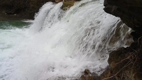View of the river with waterfall and blue water Stock Footage 303605946
