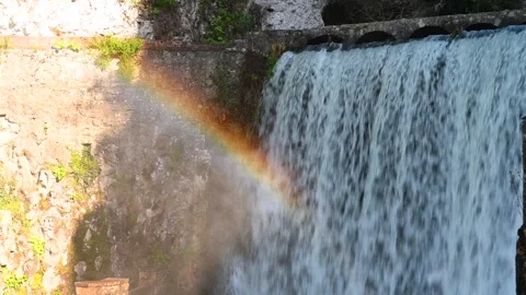 View of the river with waterfall and blue water Stock Footage 303605962