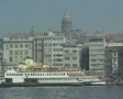 View of riverside city and Galata Tower filmed from boat SD Footage