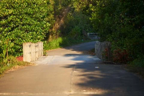 View of road and small bridge in countryside Stock Photos