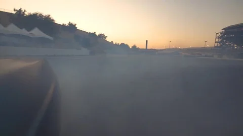 View of road behind drifting car Stock Footage 79658170
