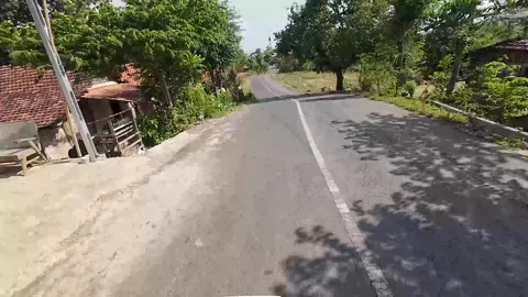 View of a road in Blora district, Central Java, Indonesia Stock Footage 334639410