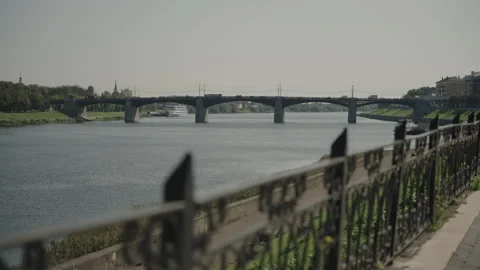 View of the road bridge from the side of the river embankment in Tver Stock Footage 318978756