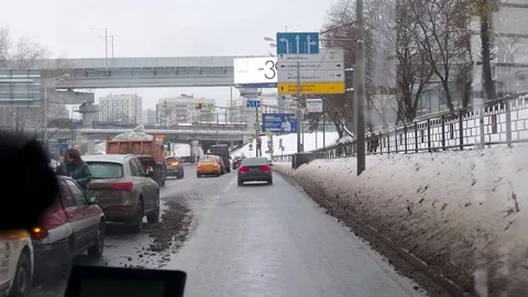 View of the road from the bus driver's cab. A bus ride through the city. Stock Footage 226631268