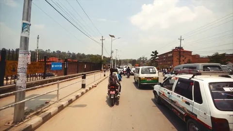 View of the road from the bus window driving to newar town Bhaktapur. Nepal Stock Footage 73607916