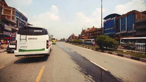 View of the road from the bus window driving to newar town Bhaktapur. Nepal Stock Footage 73607919