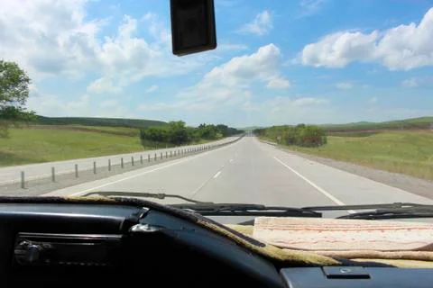 View of the road from the car. Stock Photos
