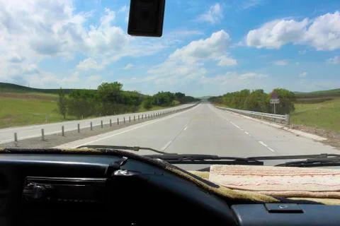 View of the road from the car. Stock Photos