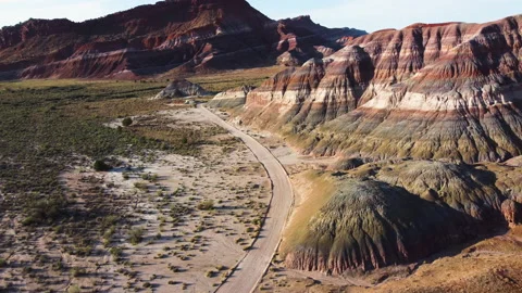 View of a road crossing a plain in a canyon, zoom, aerial view. Old Paria Video stock 167532958