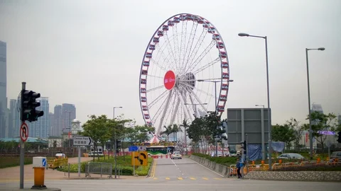 View of the Road in Front of Hong Kong Ferris Wheel on a Cloudy Day 4k Stock Footage 123040927