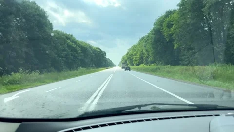 View of the road from the front window of the car Stock Footage 245410819
