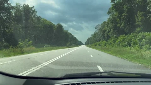 View of the road from the front window of the car Stock Footage 245410917