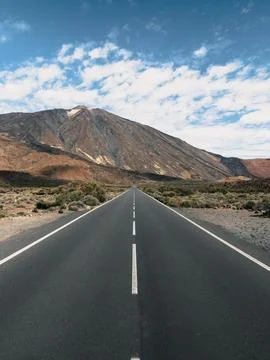 View of a road heading to Teide Volcano, Teide National Park, Tenerife. Stock Photos