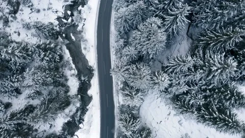 View on a road in the mountains in winter Stock Footage 146036966