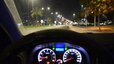 View of the road at night from the car the dashboard lights up Видео 134328086