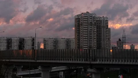View of the road overpass against the backdrop of rapidly floating clouds Stock Footage 161148944