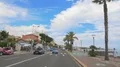 View on road with palms and embankment in resort city, vacation, journey 4k or 4k+ Resolution