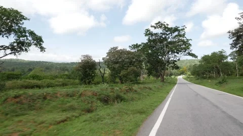 View of road passing through countryside Vídeo Stock 156971106
