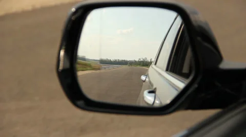 View of the road in the rearview mirror Vídeo Stock 38544437