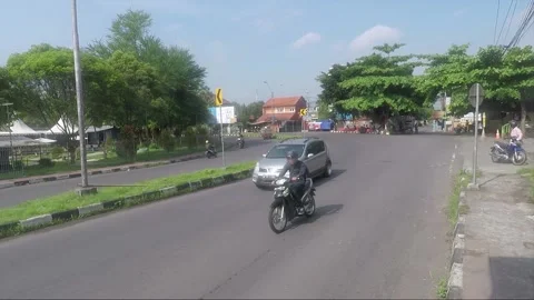 View of the road through vehicle window, Yogyakarta, Java, Indonesia Stock Footage 150431112