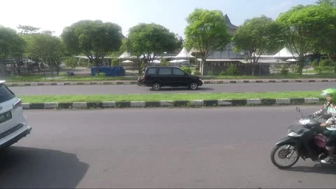 View of the road through vehicle window, Yogyakarta, Java, Indonesia Stock Footage 150443575