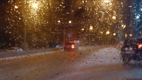 View of road through windshield of car during difficult weather conditions .. Stock Footage 256633651